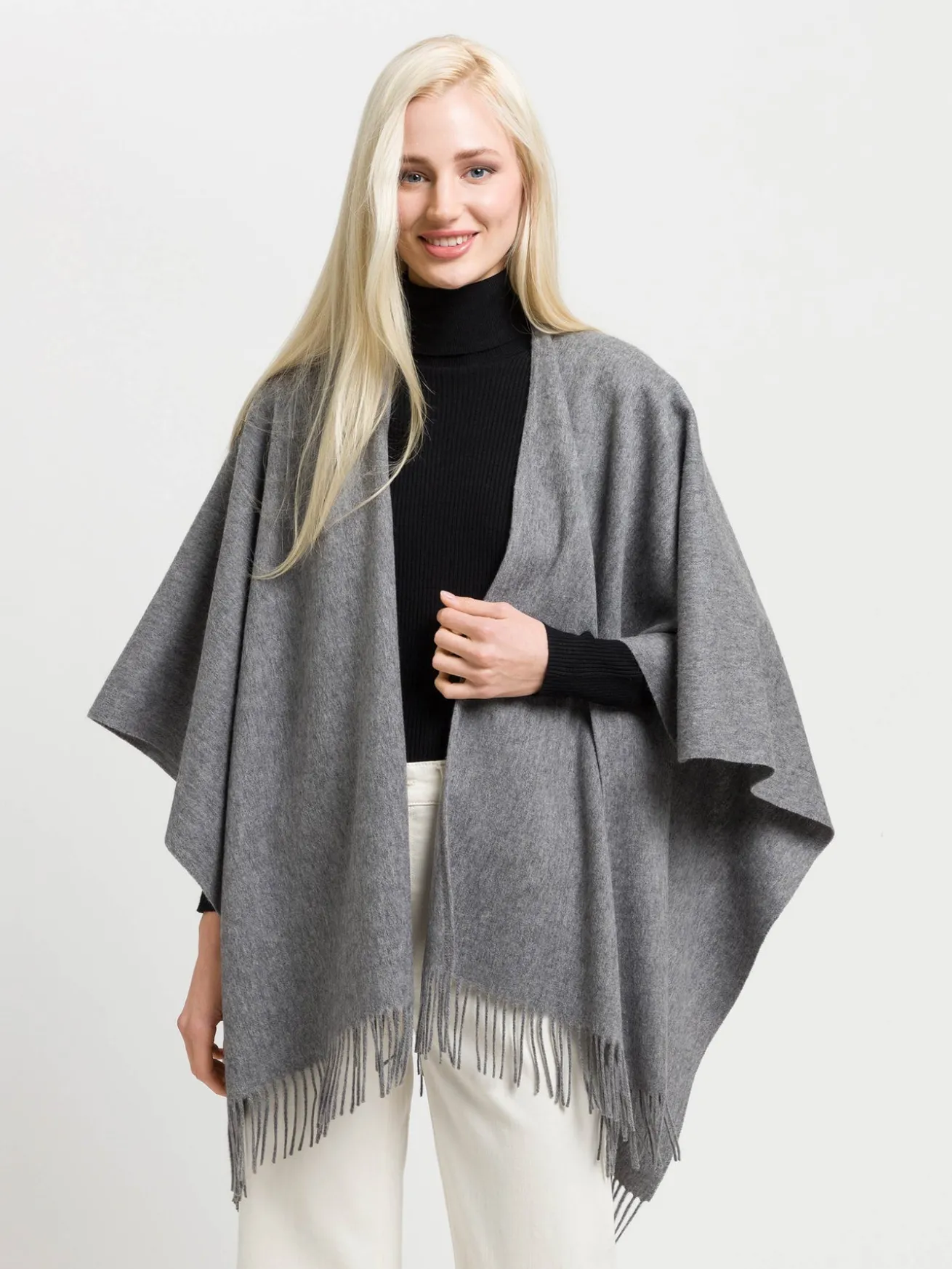 Einfarbiger Poncho aus reiner Wolle