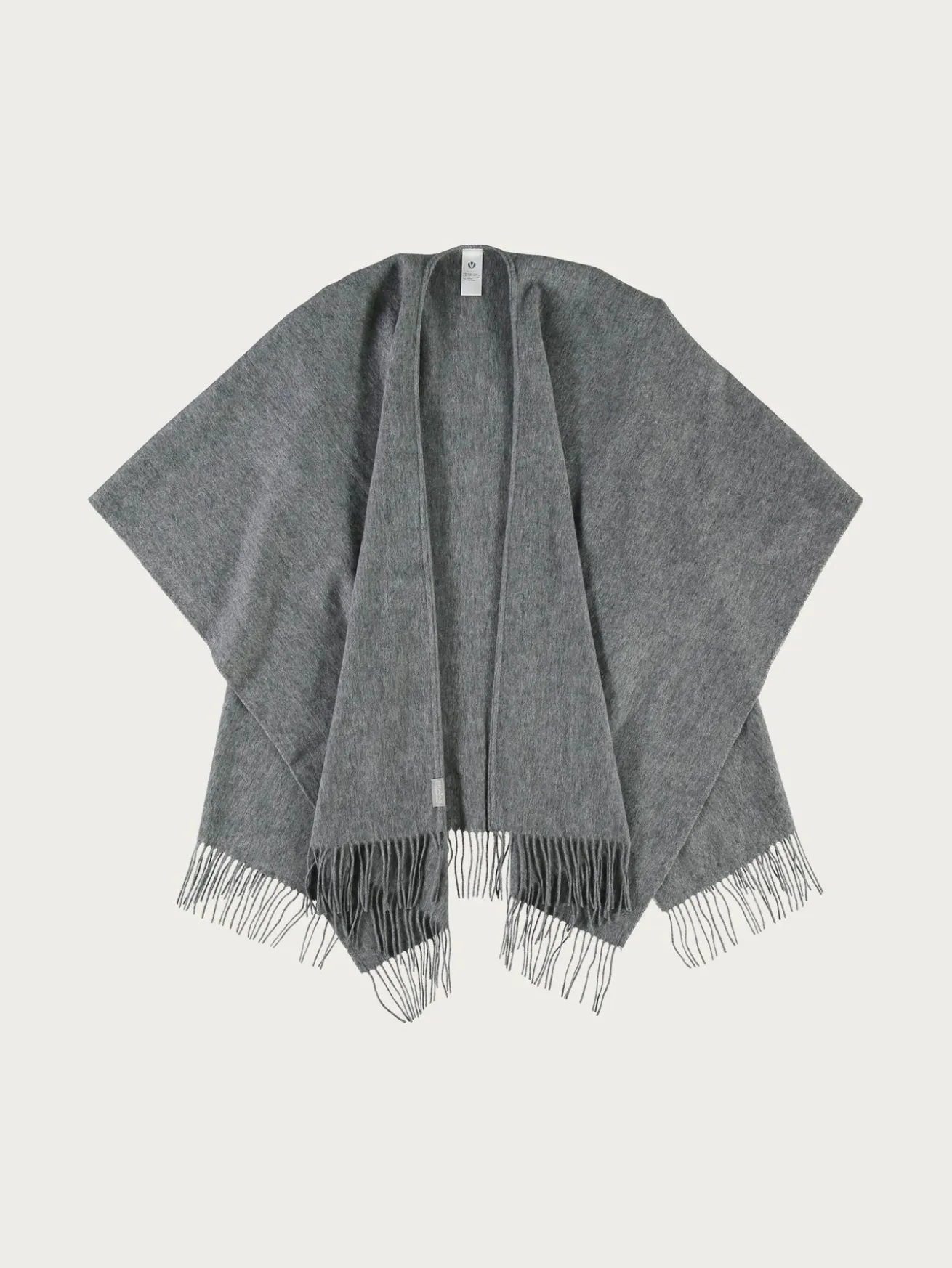 Einfarbiger Poncho aus reiner Wolle